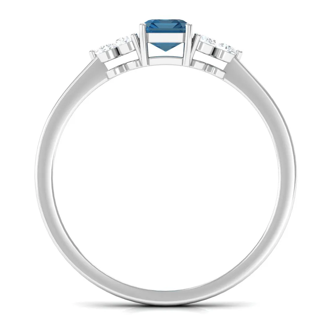 1 CT Emerald Cut London Blue Topaz Solitaire Ring with Diamond Trio