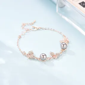 Alloy Bracelet With Rhinestones And Pearl Points