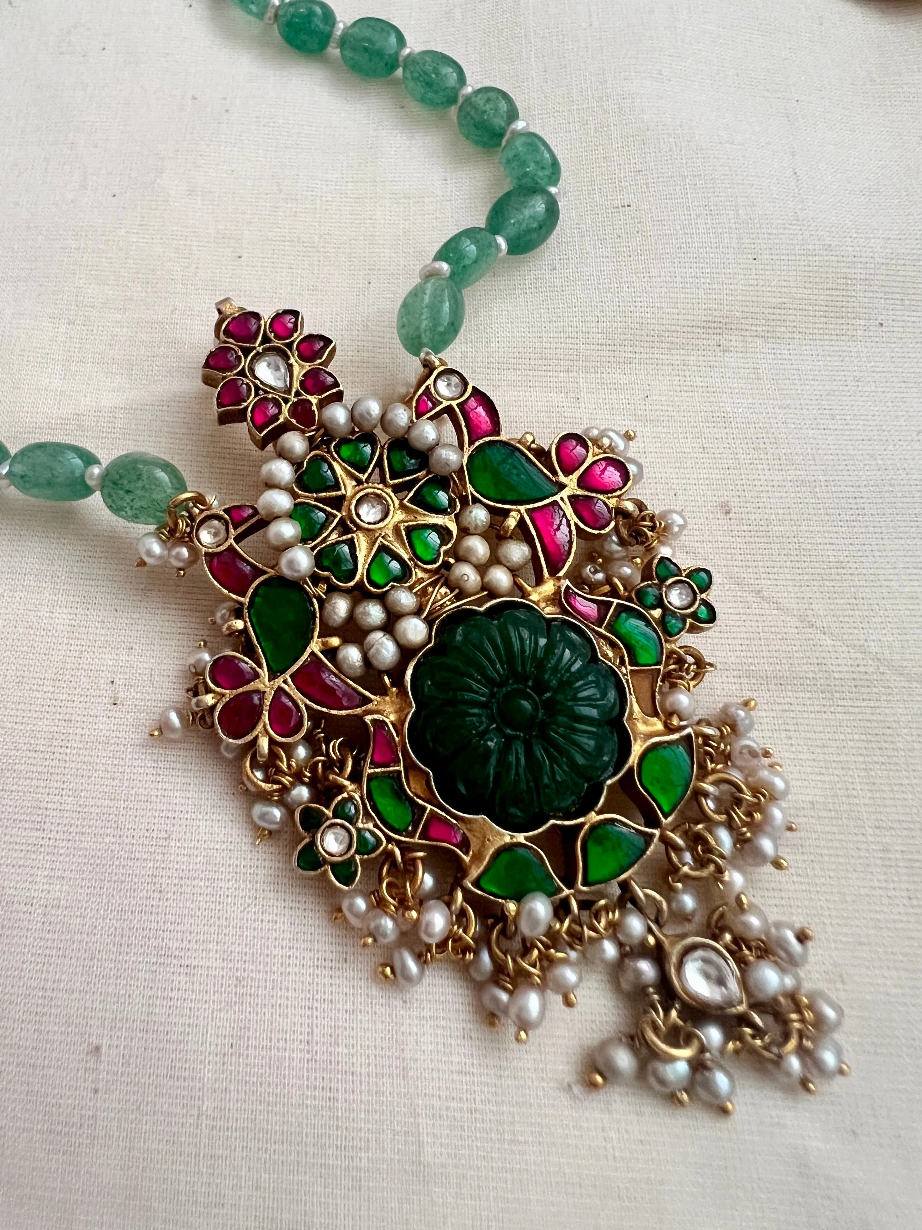 Gold polish simulated kundan, ruby & emerald pendant,  jade & pearls beads chain