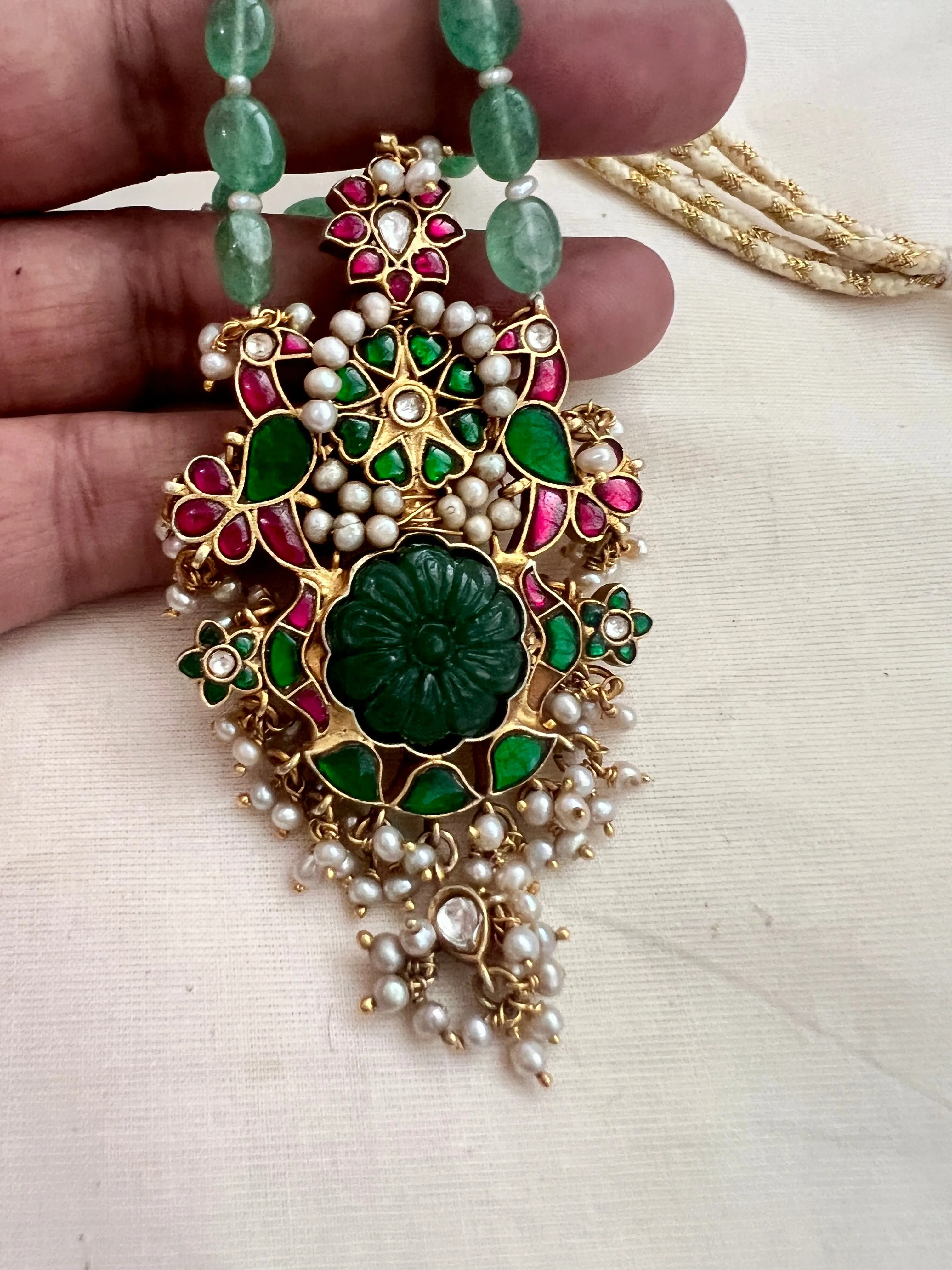 Gold polish simulated kundan, ruby & emerald pendant,  jade & pearls beads chain