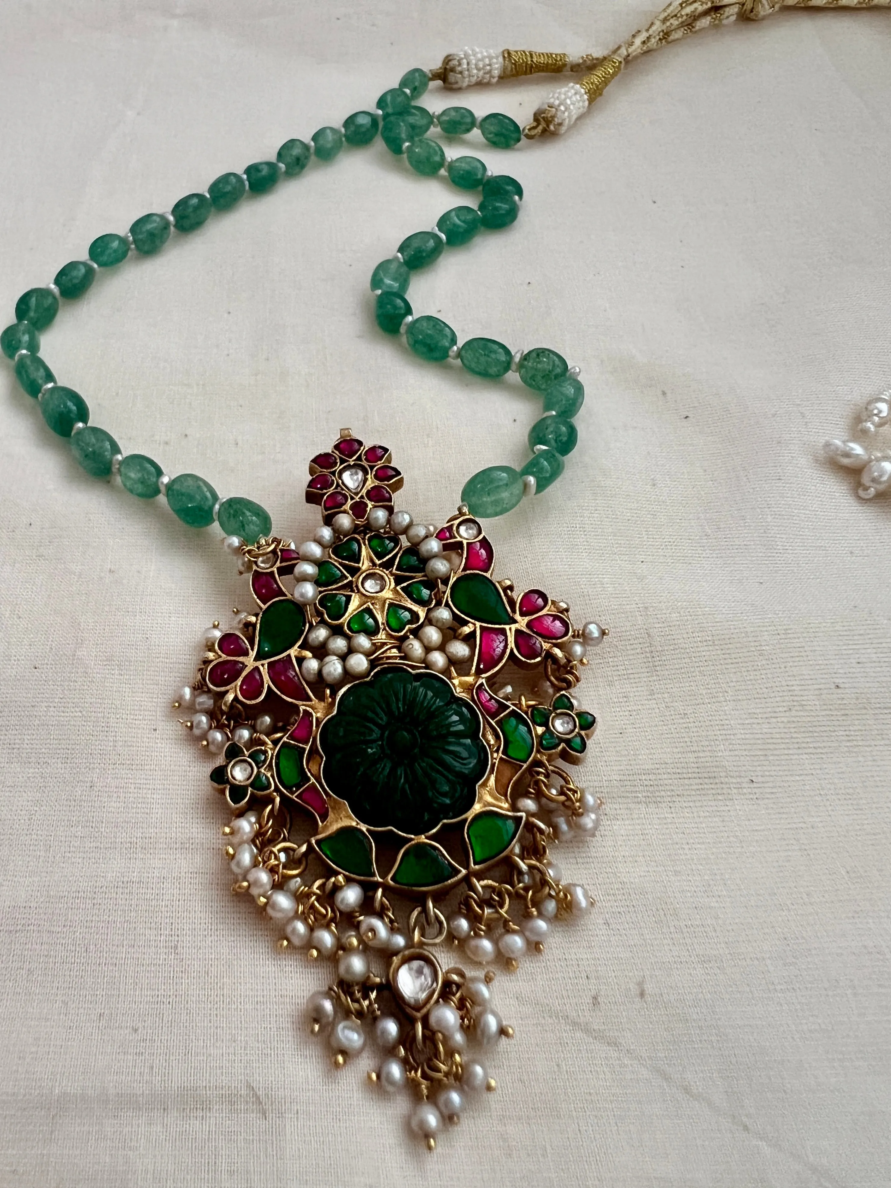 Gold polish simulated kundan, ruby & emerald pendant,  jade & pearls beads chain