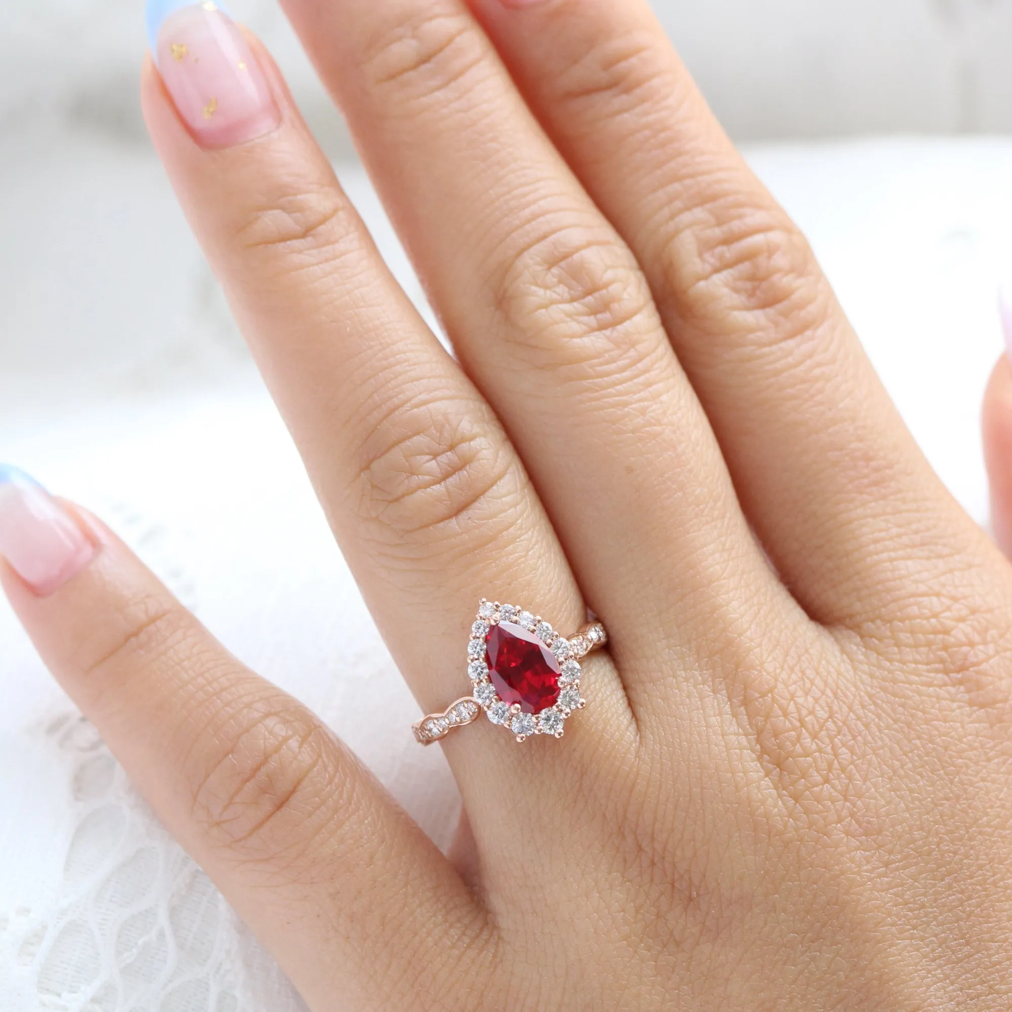 Large Pear Ruby Engagement Ring in Tiara Halo Diamond Scalloped Band