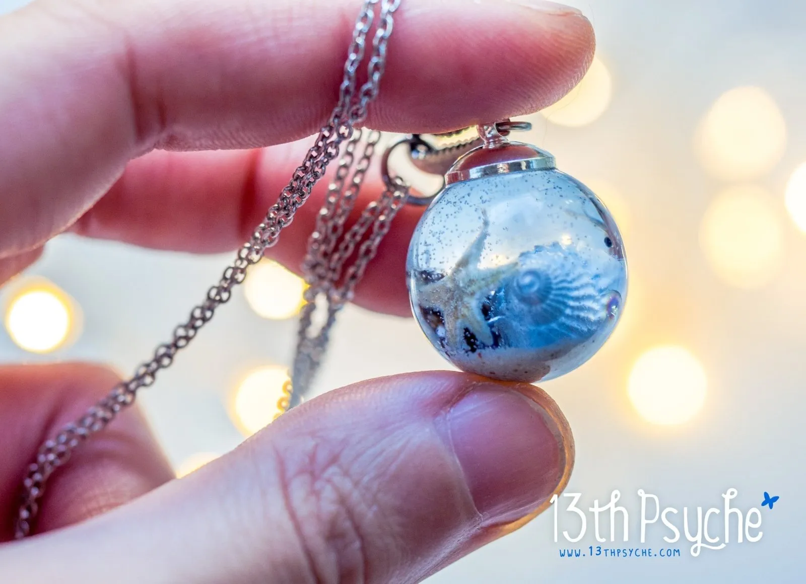 Ocean inspired Starfish and shells resin ball necklace