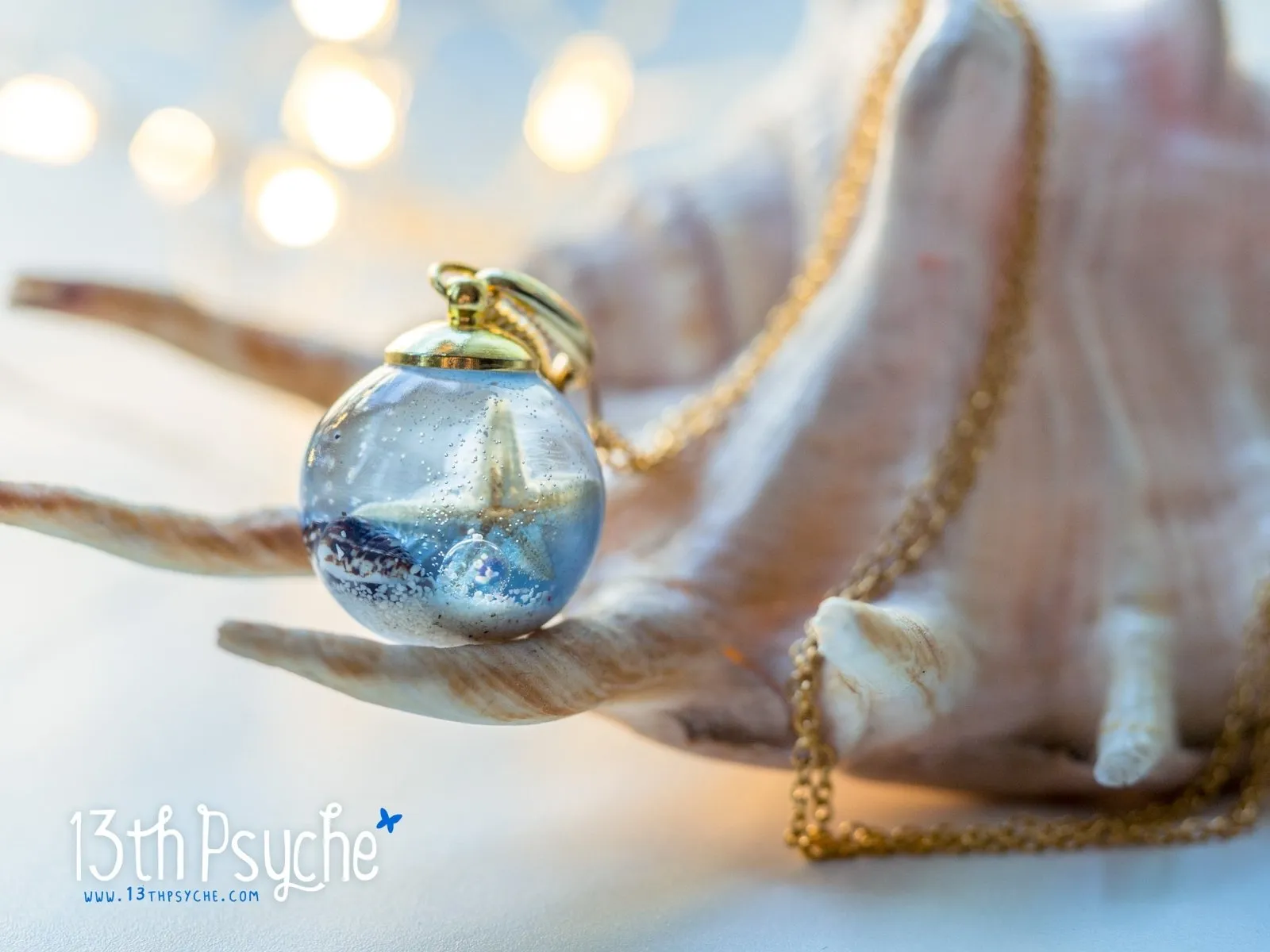 Ocean inspired Starfish and shells resin ball necklace