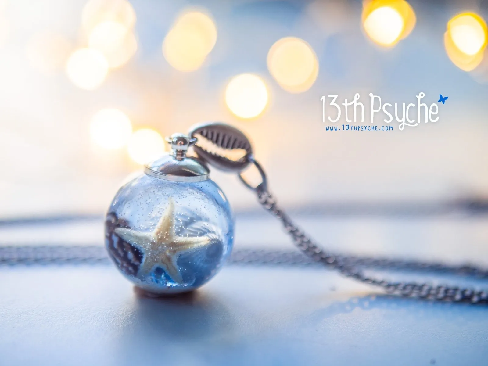 Ocean inspired Starfish and shells resin ball necklace