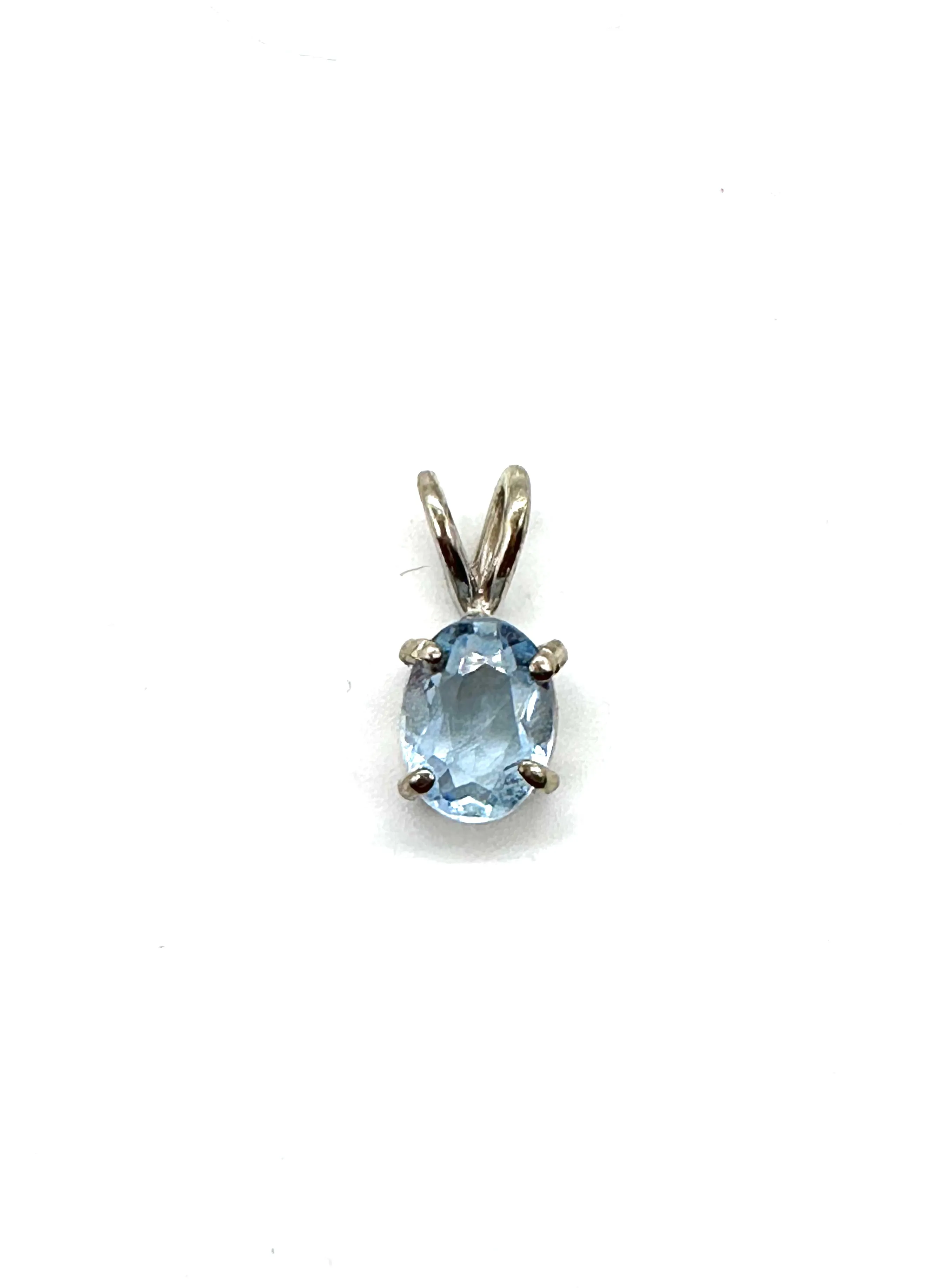 Oval blue topaz pendant