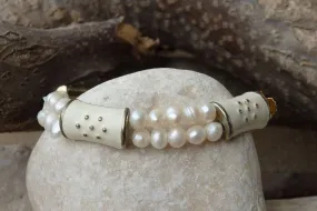 Pearl bracelet.