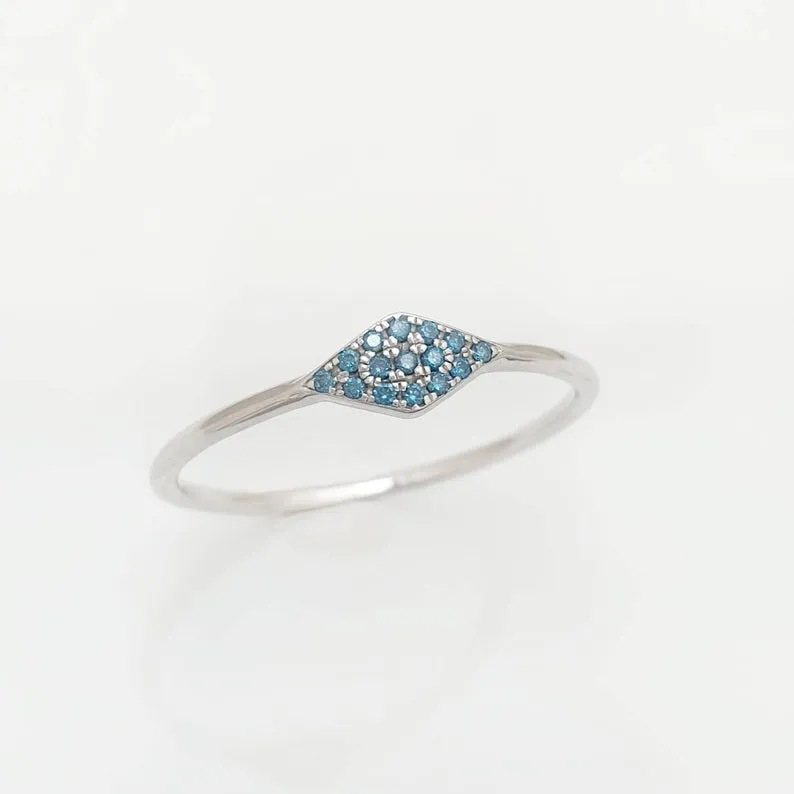 Triangle ring with blue diamonds