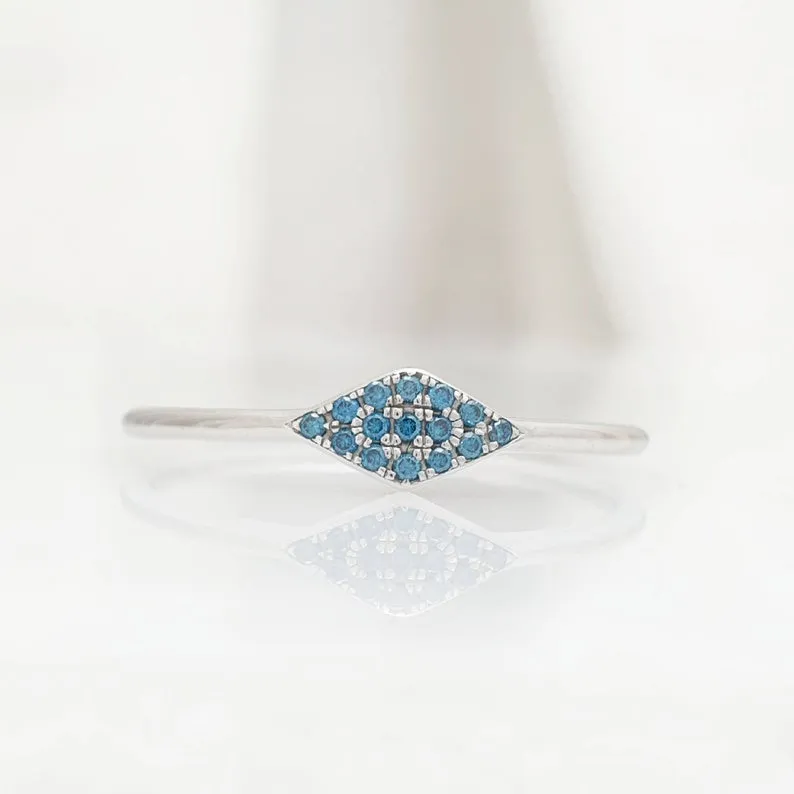 Triangle ring with blue diamonds