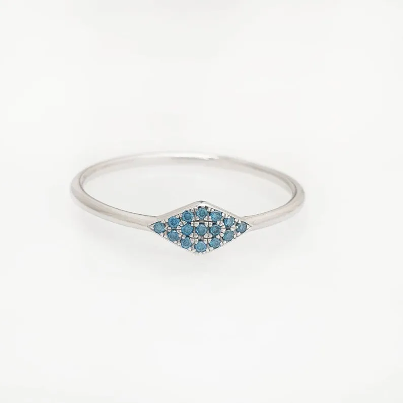 Triangle ring with blue diamonds