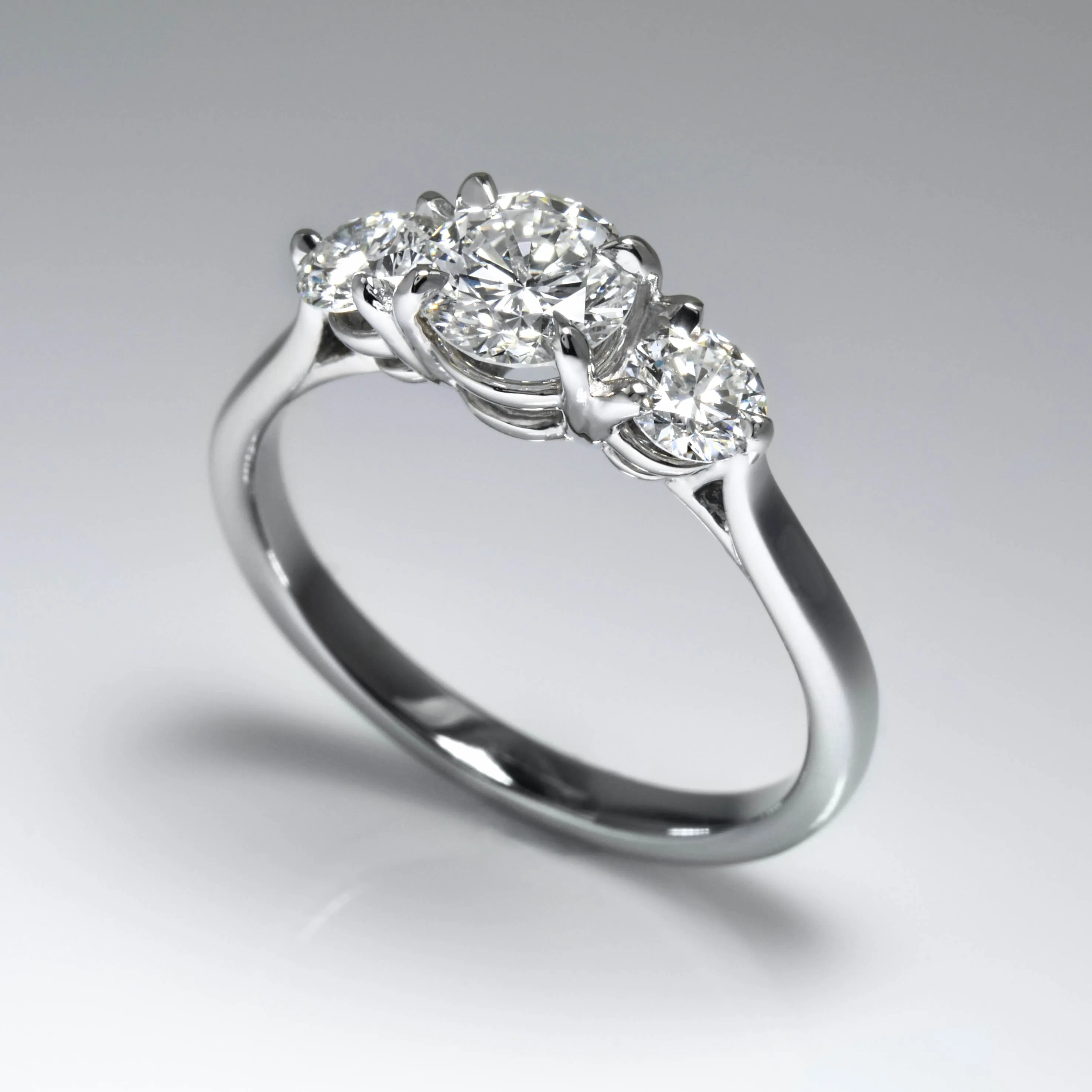 Triple Diamond Ring In Platinum